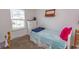 Small bedroom with twin bed, dresser, and window at 567 Woodholme Dr., Conway, SC 29526
