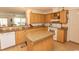 Kitchen with granite countertops and light wood cabinets at 567 Woodholme Dr., Conway, SC 29526
