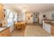 Kitchen with island and view into adjoining dining area at 567 Woodholme Dr., Conway, SC 29526