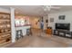 Open concept living room with kitchen views, breakfast bar and neutral color palette at 567 Woodholme Dr., Conway, SC 29526