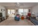 Living room with comfy seating and access to sunroom at 567 Woodholme Dr., Conway, SC 29526