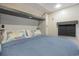 Comfortable bedroom with a queen bed and fish-themed pillows at 6001 - 8047 S Kings Hwy., Myrtle Beach, SC 29575
