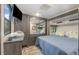 Main bedroom with a queen bed, TV, and mirrored closet at 6001 - 8047 S Kings Hwy., Myrtle Beach, SC 29575