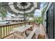 Outdoor deck with picnic table and umbrella at 6001 - 8047 S Kings Hwy., Myrtle Beach, SC 29575