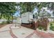 RV parked on a brick patio with a deck at 6001 - 8047 S Kings Hwy., Myrtle Beach, SC 29575