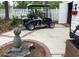 Golf cart parked on a brick patio at 6001 - 8047 S Kings Hwy., Myrtle Beach, SC 29575