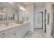 Elegant bathroom with double vanity, large mirror, and a separate shower at 6070 Tramonto St., Myrtle Beach, SC 29577
