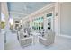 Relaxing outdoor patio area with comfortable seating and a view of the pool at 6070 Tramonto St., Myrtle Beach, SC 29577