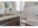 Bathroom with tub, shower, and granite countertop vanity at 856 Filliman Alley # C, Myrtle Beach, SC 29577
