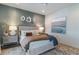 Serene bedroom with large artwork and comfortable bedding at 856 Filliman Alley # C, Myrtle Beach, SC 29577