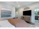 Relaxing bedroom with a large TV and ensuite bathroom access at 856 Filliman Alley # C, Myrtle Beach, SC 29577