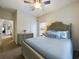 Charming bedroom features stylish furnishings and a ceiling fan for added comfort at 900 British Ln. # 1187, Myrtle Beach, SC 29579