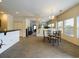Dining area with a glass table, carpeted floors, and abundant natural light at 900 British Ln. # 1187, Myrtle Beach, SC 29579