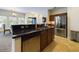 Open kitchen with black countertops, stainless steel appliances, and a breakfast bar at 900 British Ln. # 1187, Myrtle Beach, SC 29579