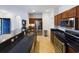 Kitchen boasting dark countertops, stainless steel appliances, and tiled floors at 900 British Ln. # 1187, Myrtle Beach, SC 29579
