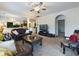 Spacious living room with carpeted floors, comfortable seating, and an open layout at 900 British Ln. # 1187, Myrtle Beach, SC 29579