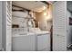 Practical laundry room with a washing machine and dryer, offering convenience for chores at 1012 N Waccamaw Dr. # 902, Murrells Inlet, SC 29576