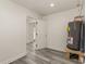 The basement has wood-look flooring and features a modern water heater at 106 Governor Boone Ln., Georgetown, SC 29440