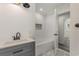 Bathroom features a gray vanity and a subway-tiled tub with a tiled niche at 106 Governor Boone Ln., Georgetown, SC 29440