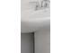 Close-up of a pedestal sink with chrome faucet at 1106 Black Lake Way, Conway, SC 29526