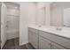 Bathroom with a double vanity and a shower/tub combo at 1106 Black Lake Way, Conway, SC 29526