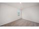 Bright bedroom with a window offering natural light and neutral carpet at 1106 Black Lake Way, Conway, SC 29526