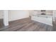 Open concept dining area with wood-look floors at 1106 Black Lake Way, Conway, SC 29526