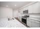 Modern kitchen with stainless steel appliances and granite countertops at 1106 Black Lake Way, Conway, SC 29526