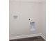 Laundry room with hookups and shelving at 1106 Black Lake Way, Conway, SC 29526