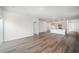 Open living room and kitchen area with wood-look floors at 1106 Black Lake Way, Conway, SC 29526