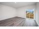 Spare bedroom with sliding door access to the backyard at 1106 Black Lake Way, Conway, SC 29526