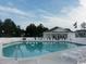 Community pool with plenty of lounge chairs at 1143 Freeboard St. # 203, Murrells Inlet, SC 29576