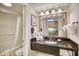 Clean bathroom with vanity, sink, and shower/tub combo at 1200 N Ocean Blvd. # 910, Myrtle Beach, SC 29577