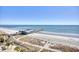 Elevated view of beach, pier, and ocean at 1200 N Ocean Blvd. # 910, Myrtle Beach, SC 29577