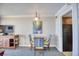 Small dining area with table and chairs, near kitchen at 1200 N Ocean Blvd. # 910, Myrtle Beach, SC 29577