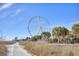 Beachfront view of a Ferris wheel and surrounding area at 1200 N Ocean Blvd. # 910, Myrtle Beach, SC 29577