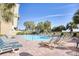 Outdoor pool with ample lounge chairs at 1200 N Ocean Blvd. # 910, Myrtle Beach, SC 29577