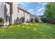 Large backyard with grassy area and privacy fence at 1247 Brighton Ave., Myrtle Beach, SC 29588