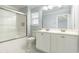 Bathroom with double vanity, shower, and tile floor at 1247 Brighton Ave., Myrtle Beach, SC 29588