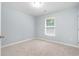Simple bedroom with neutral walls and carpeted floors at 1247 Brighton Ave., Myrtle Beach, SC 29588