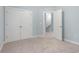 Bedroom with double doors and access to upstairs at 1247 Brighton Ave., Myrtle Beach, SC 29588