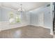 Bright dining room with hardwood floors and neutral walls at 1247 Brighton Ave., Myrtle Beach, SC 29588