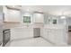 White kitchen with stainless steel appliances and breakfast bar at 1247 Brighton Ave., Myrtle Beach, SC 29588