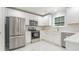 Modern kitchen with white cabinets and stainless steel appliances at 1247 Brighton Ave., Myrtle Beach, SC 29588