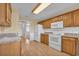 Kitchen with oak cabinets and white appliances at 1377 Southwood Dr., Myrtle Beach, SC 29575