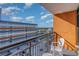 Balcony with chairs and partial ocean view at 1501 S Ocean Blvd. # 1418, Myrtle Beach, SC 29577