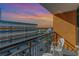 Relaxing balcony with sunset view and seating for two at 1501 S Ocean Blvd. # 1418, Myrtle Beach, SC 29577