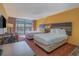 Hotel bedroom with two beds and balcony access at 1501 S Ocean Blvd. # 1418, Myrtle Beach, SC 29577