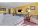 Bright hotel room featuring two double beds and seating area at 1501 S Ocean Blvd. # 1418, Myrtle Beach, SC 29577