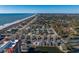 Aerial view of community, tennis court, and ocean at 1801 N Ocean Blvd. # K1, North Myrtle Beach, SC 29582